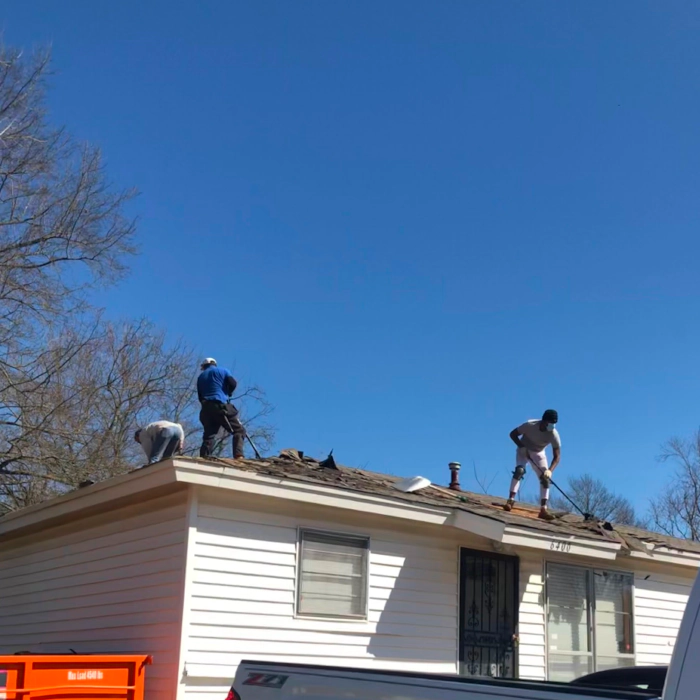 roofers doing roof replacement
